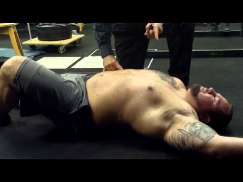 Back Rehab: Dr. Stuart McGill with Brian Carroll – McGill curl -up, with Neuro-muscular pulse